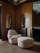 Wanderer Natural upholstered Wickham armchair by And Object in a beautifully textured fabric, captured in a sophisticated setting by Michael Sinclair.
